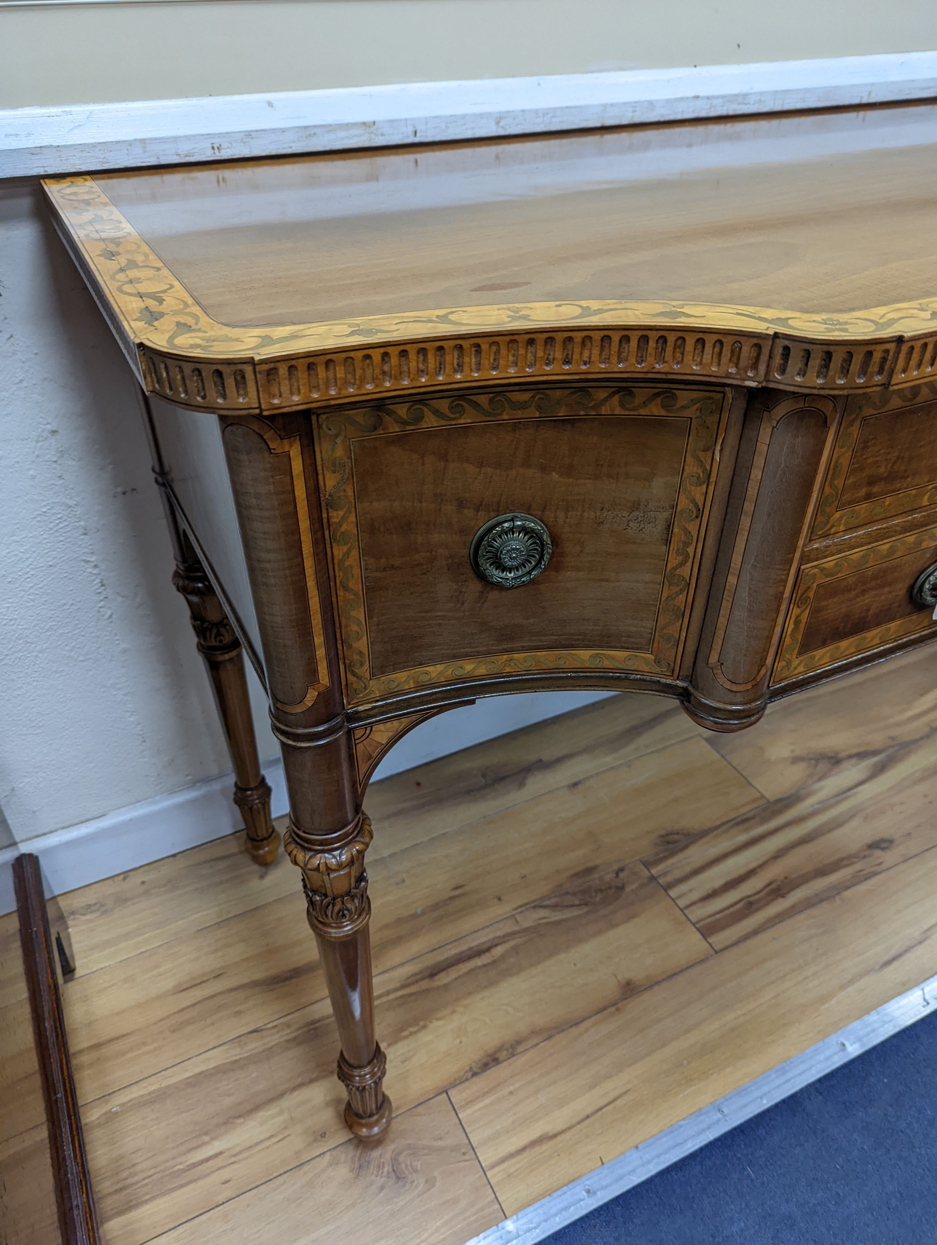 An early 20th century Sheraton style satinwood banded and marquetry inlaid mahogany breakfront sideboard, length 122cm, depth 58cm, height 82cm